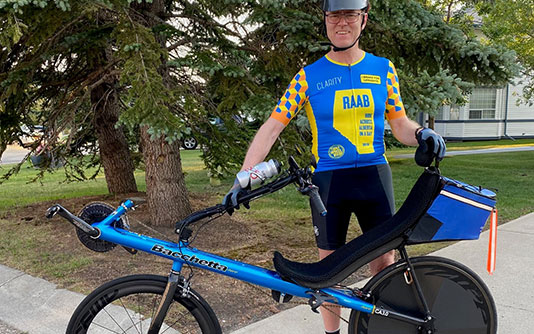 John McWhae with the special bike he built to cycle across Alberta.